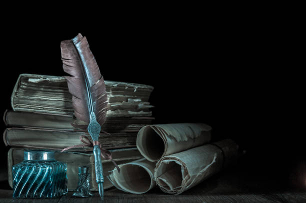 istock Quill pen and old books 1200699916