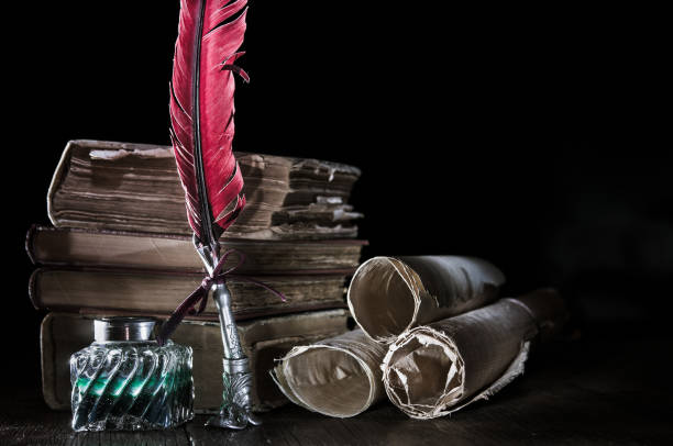 istock Quill pen and old books 1200701212