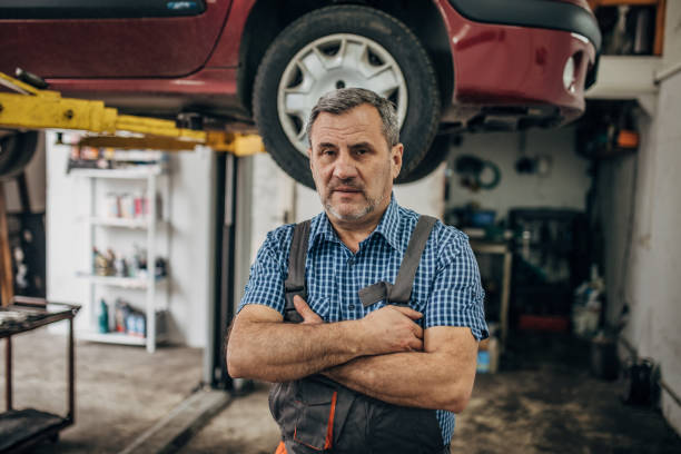 istock Portrait of owner in auto service 1200702211