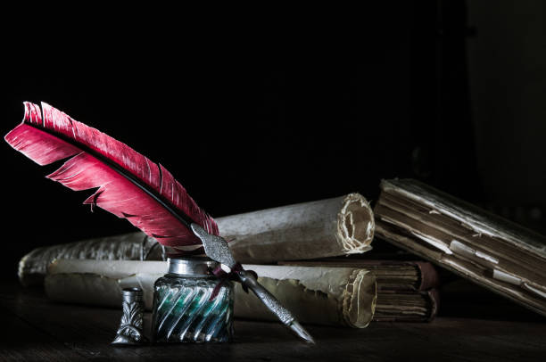 istock Quill pen and old books 1200702645