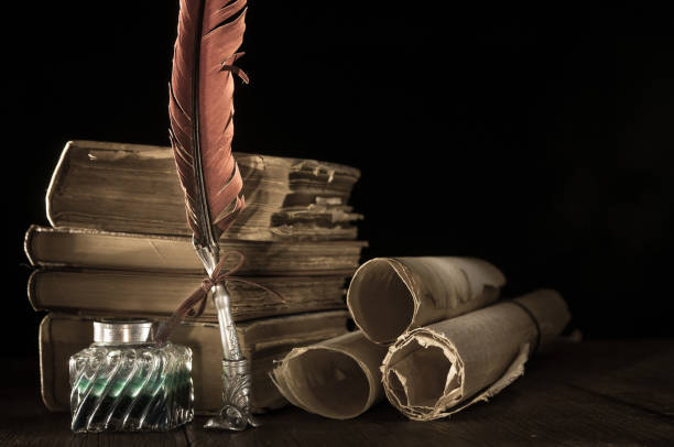istock Quill pen and old books 1200702818
