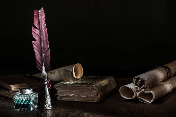 istock Quill pen and old books 1200703006