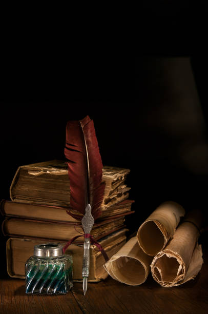istock Quill pen and old books 1200704067