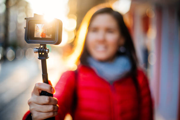 istock Woman vlog on street 1200706707