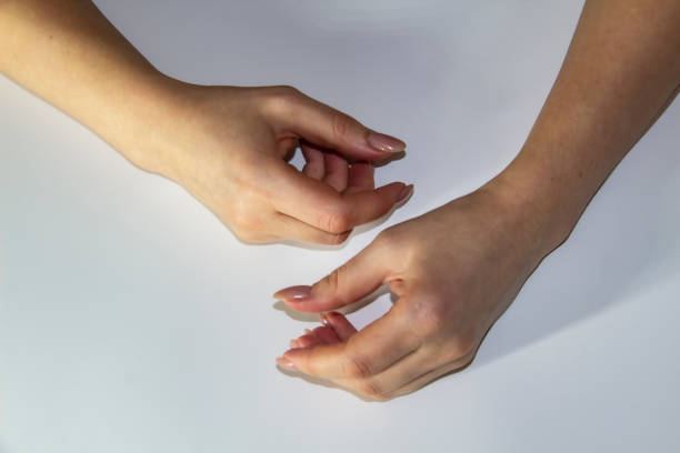 istock A composition of Women's hands which show move light background. Female hands show something. Concept with female hands. 1200708048
