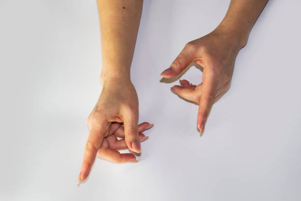 istock A composition of Women's hands which show move light background. Female hands show something. Concept with female hands. 1200708058