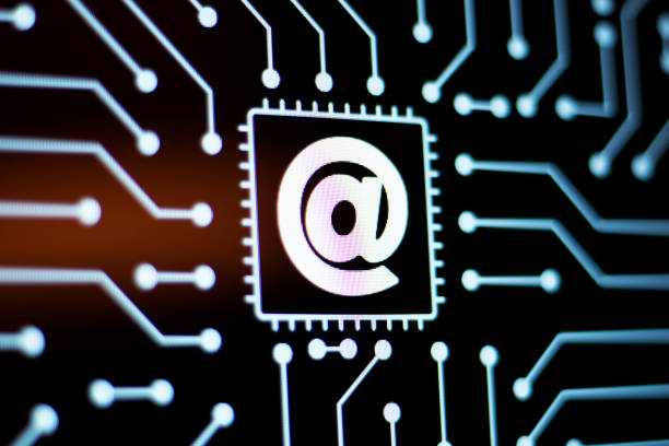 istock Technology Background and Circuit Board With At symbol. Close-Up Computer Screen Concept. 1200708974