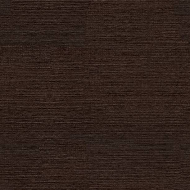 istock Close up of dark brown paper. Seamless square background, tile ready. 1200709794