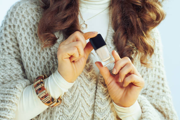 istock Closeup on modern female with nail polish 1200709802
