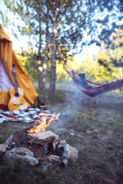 istock Campfire outside of tent 1200712103