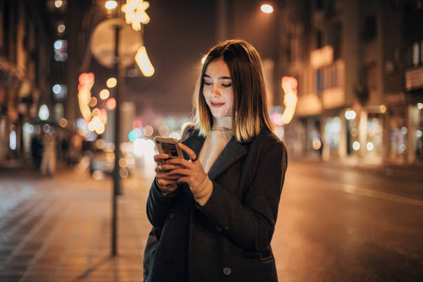 istock Young woman texting to friend 1200715726