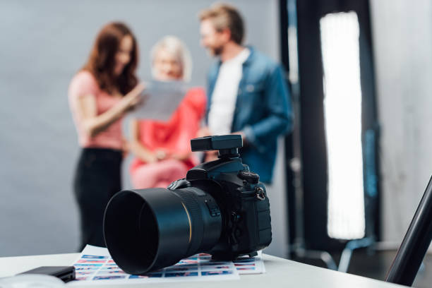 istock selective focus of modern digital camera in photo studio 1200716834