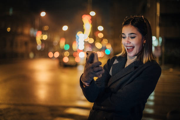 istock Pretty young woman using smart phone 1200717553