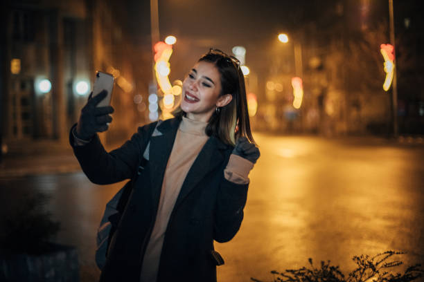 istock Woman taking a selfie 1200717679