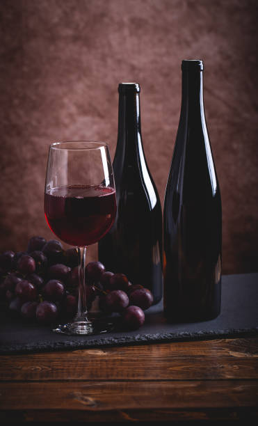 istock Glass of Wine and Grapes 1200719293