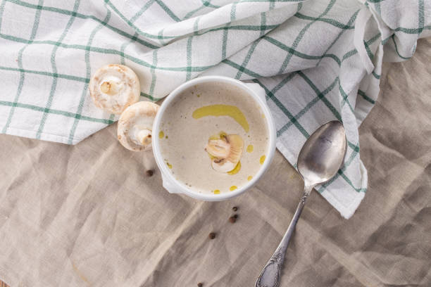 istock champignon cream soup in white bowl with napkin on grey tablecloth 1200719686