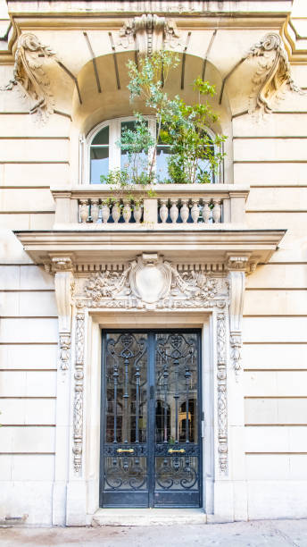 istock Paris, a wooden door, typical building 1200721216
