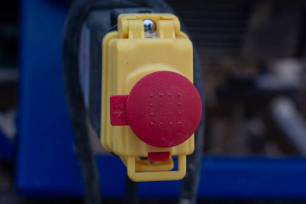 istock view of the stop button on the woodworking machine close-up 1200721468
