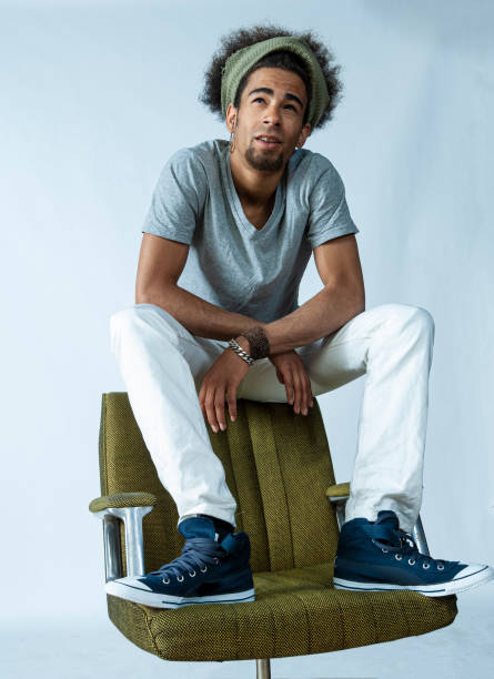 istock funky man in office chair 1200723290