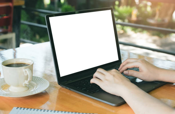 istock the man sitting the chair research course online website and studying learning on a mockup white screen laptop. e-learning education 1200724549