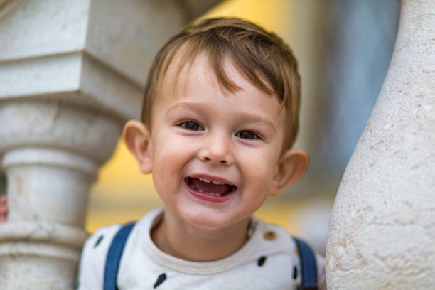 istock Toddler boy having fun outdoors 1200724817
