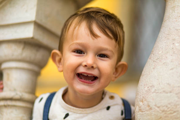 istock Toddler boy having fun outdoors 1200724898
