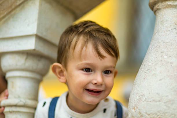 istock Toddler boy having fun outdoors 1200724903