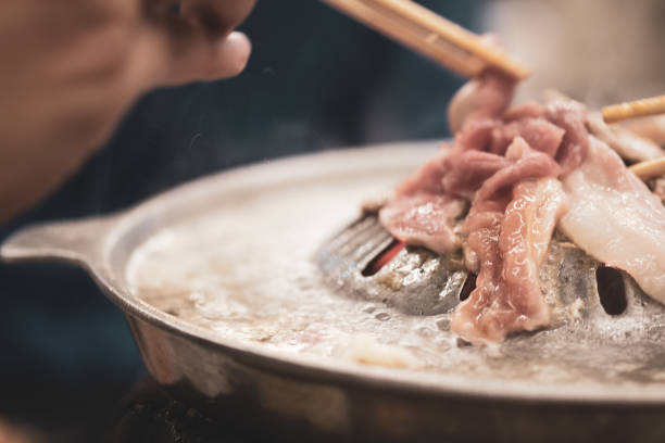 istock Thai barbecue grill Pork on hot pan buffet 1200724995