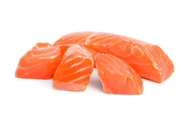 istock raw salmon piece cube isolated on white background close up 1200731466