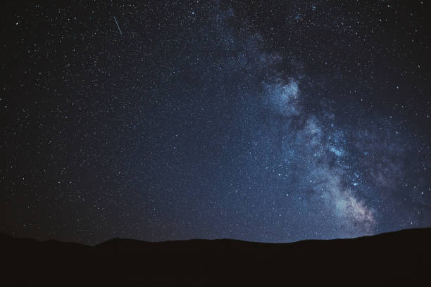 istock night sky with milky way on mountain background 1200732862