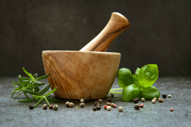 Mortar and pastle with fresh herbs