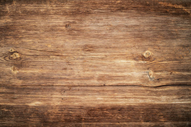 istock Brown unpainted natural wood with grains for background and texture. 1200737764