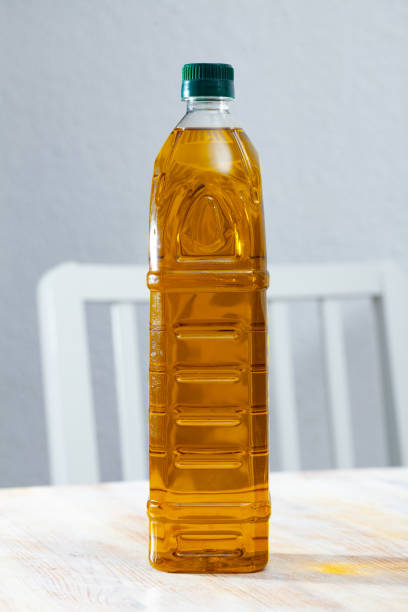istock Bottle with olive oil on the table 1200740078