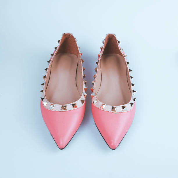 istock female summer shoes on blue tones 1200741684