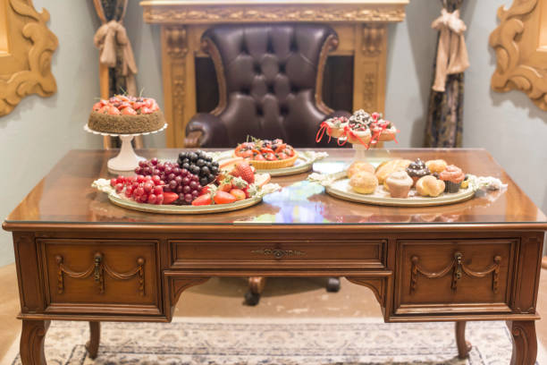 istock Fruit and bread on antique wooden table 1200742385