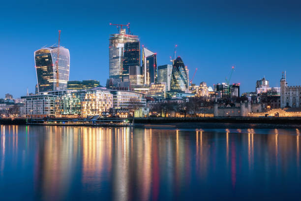 istock London skyscraper skyline with reflection in Thames river during twilight in London, UK 1200743150