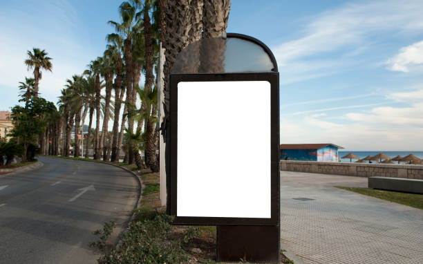 istock billboard in downtown city division highway with palm trees walk with blue sky 1200745124