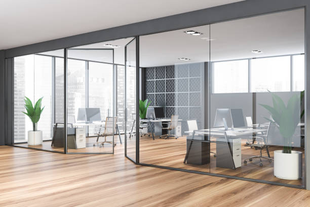 istock Gray and metal open space office corner 1200746745