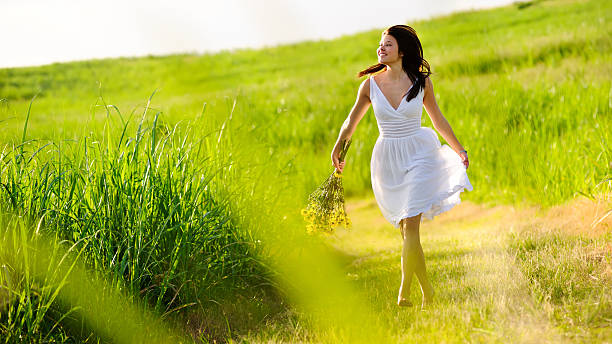 adorable happy summer woman skipping