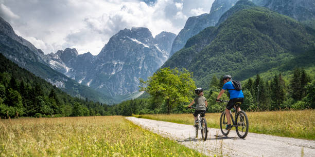 Father and son on a cycling trip to the mountains