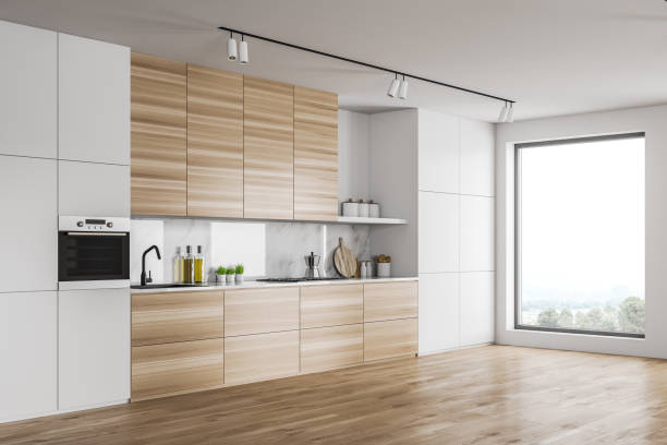 istock Loft white kitchen with wooden countertops 1200749054