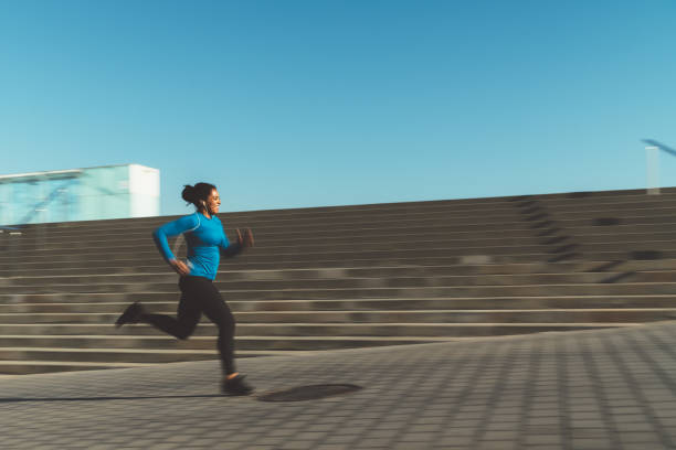 istock Sportswoman jogging 1200750862