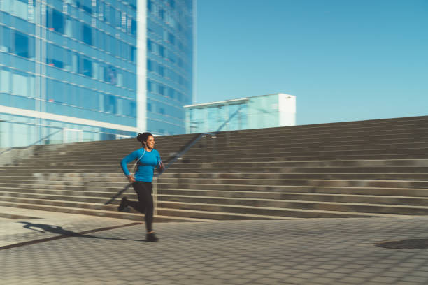 istock Sportswoman jogging in the morning 1200751165