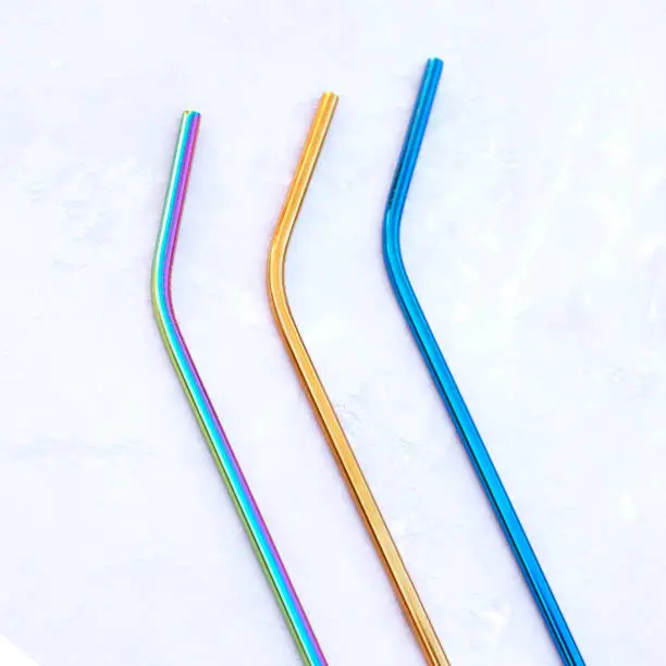 Photo of Eco tubules iron and bamboo on a gray background.