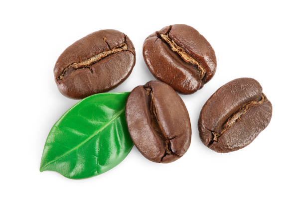 istock roasted coffee beans with leaves isolated on white background with clipping path and full depth of field. Top view. Flat lay. 1200756177