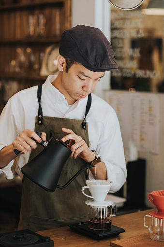 Barista showing different types of Brewed Coffee, drip coffee, Thailand, Bangkok, lifestyles, business