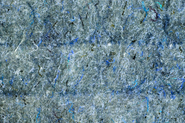 istock Background of blue felt fabric, texture of material with pile and thread 1200762477