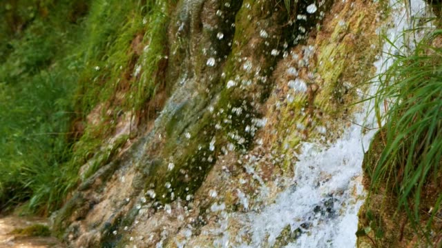 macro detail video near waterfall, Italian mountain shot in super slow motion, Video HD