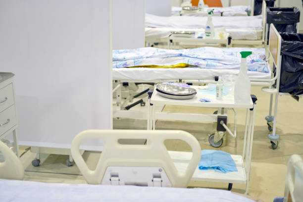 istock Hospital couches ready to receive patients in a row. 1200764150