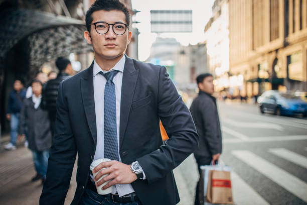 istock Young elegant man is having takeaway coffee 1200765610